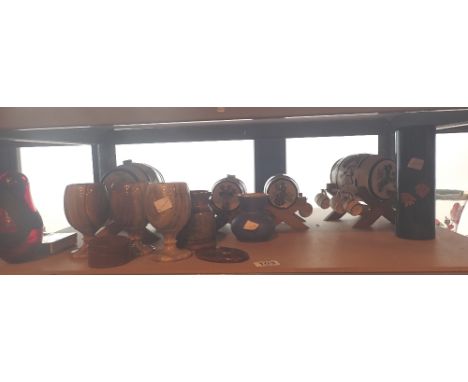 Shelf of mixed ceramics including trio of onyx goblets 