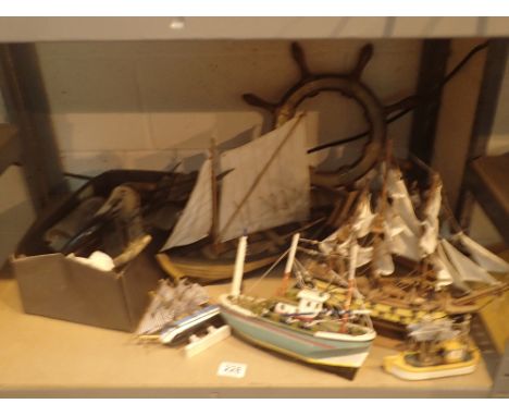 Shelf of model ships and collection of horn items 