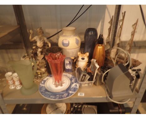 Shelf of mixed items including Capodimonte, galleon, vases, camera and editor etc