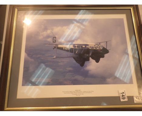 Framed and glazed picture of De Havilland DH89A signed by Pilot Capt T K Ball