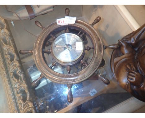 Aneroid barometer in the form of a ships wheel