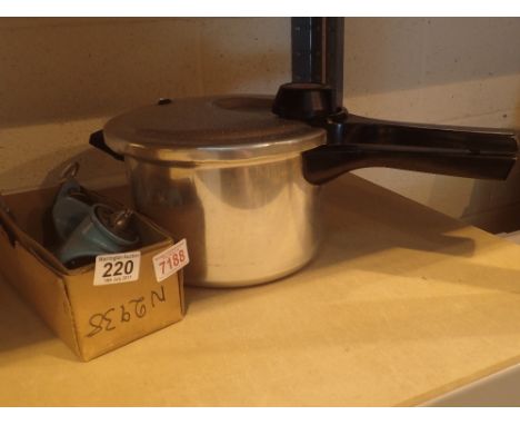 Vintage hand powered mincer and pressure cooker