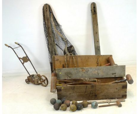 A group of vintage garden games sporting equipment, comprising two croquet sets, label to lid 'Club Croquet, including hoops 