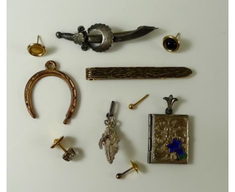 A 9ct gold bark effect tiepin, 4.1g, together with a silver a enamel locket formed as a book, a silver Victorian brooch model