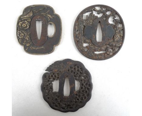 A group of three Japanese tsuba, 19th and early 20th century, the first of mokkogata shape, cast in high relief with gilded s