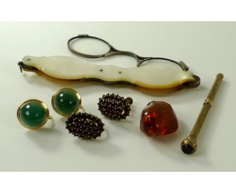 A pair of 9ct gold earrings with conical jade cabochons, screw backs, 6g, together with a pair of yellow metal earrings set w