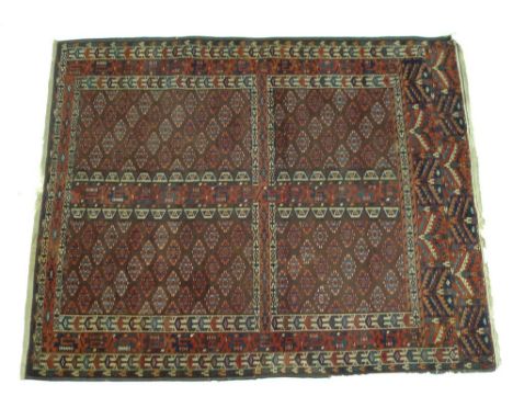 A finely knotted Persian prayer rug, early 20th century, with dark brown ground and geometric patterns in dark red, blue and 