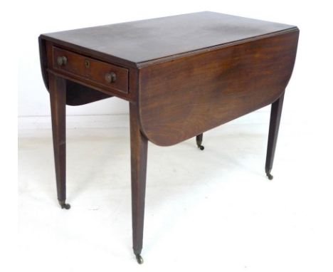 A Regency mahogany Pembroke table, the rectangular surface with drop leaves, single drawer with turned handles, raised on squ
