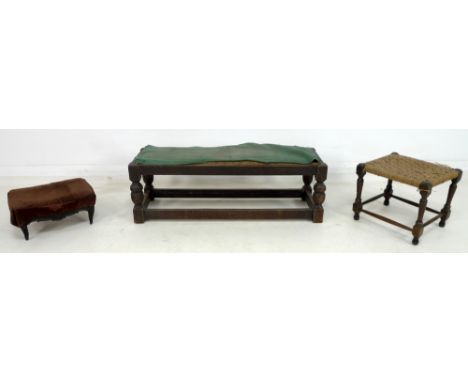 A group of three foot stools, comprising a small French 19th century stool with cabriole legs and brown upholstery, 37 by 30 