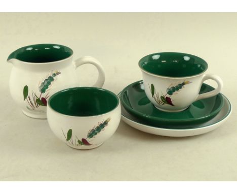 A Denby part dinner service, decorated with the 'Greenwheat' pattern, by A. College (produced between 1956-1977), comprising 