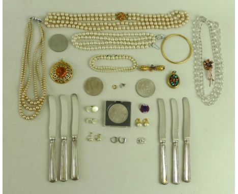 A collection of costume jewellery and coins, including simulated pearls, a cut glass necklace with graduated beads, an enamel