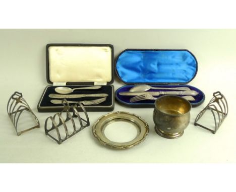 A group of Victorian and later silver items, comprising three matching George V silver toast racks, each with four divisions 