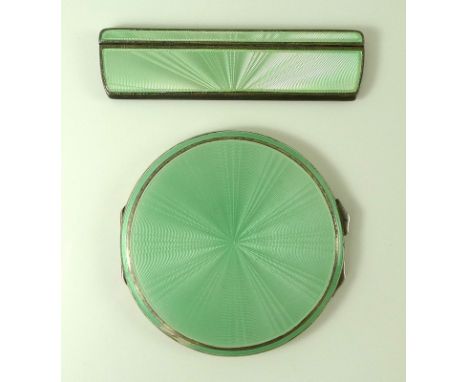 An Asprey Art Deco, silver and green guilloche enamel compact and matching comb cover, Birmingham 1937, with hallmark and 'As