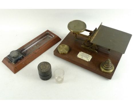 An Edwardian desk stand, by Asprey, London, in red leather, with drop in clear glass pen tray and silver mounted inkwell, Lon