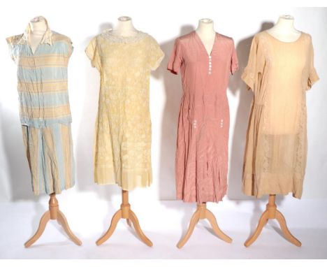 Circa 1920s Day Dresses, comprising a yellow muslin short sleeve drop waist dress, with cream floral embroidery overall, lace
