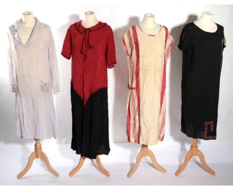 Circa 1920s Day Dresses, comprising a black crepe short sleeve shift dress with scoop neck, dark cream chiffon trims, red and