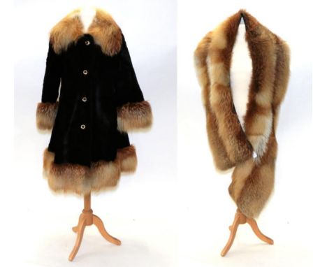 A Black Panelled Fur Coat with Fox Fur Trim, to the collar, cuffs and hem, single breasted, with additional Fox Fur Stole,  b