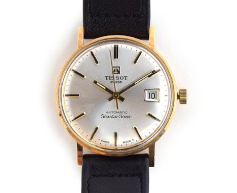 A GENTLEMAN'S 9CT GOLD TISSOT SEASTAR SEVEN WRIST WATCH DATED 1978, REF OP44547, SILVERED DIAL, APPLIED BATON MARKERS, STRAIG