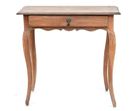 A 19th century French provincial side table, with frieze drawer, shaped apron, and cabriole legs Provenance: from the estate 