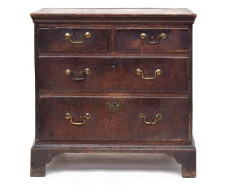 A small George II oak chest of two short over two long drawers, with swan neck handles, raised on bracket feet, 76x49x76cmH 