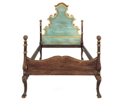 A 19th century Italian green painted pine and parcel gilt bedstead, with rococo headboard and stylised pineapple finials, 125