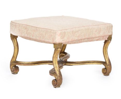 A 19th century upholstered giltwood stool, on acanthus leaf carved scroll supports with carved X stretcher, 55cmWProvenance: 
