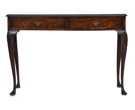 A George I style rectangular walnut side table, fitted with two frieze drawers on shell carved cabriole legs, 110cmWProvenanc