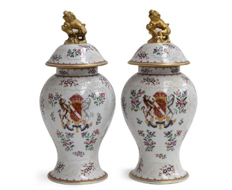 A pair of Samson famille rose and armorial baluster vases and covers, with gilt kylin knops, 40cmHProvenance: from the estate