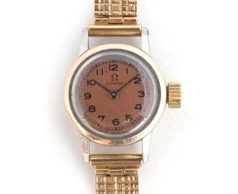 A LADIES STEEL AND ROSE GOLD OMEGA WRIST WATCH *NOT RUNNING* CIRCA 1930s, ref 9885382, dial signed Omega, salmon pink dial, w