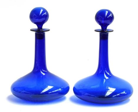 A pair of Bristol blue glass ship's decanters with stoppers, each 28cmHProvenance: from the estate of Elizabeth Pepys-Cockere