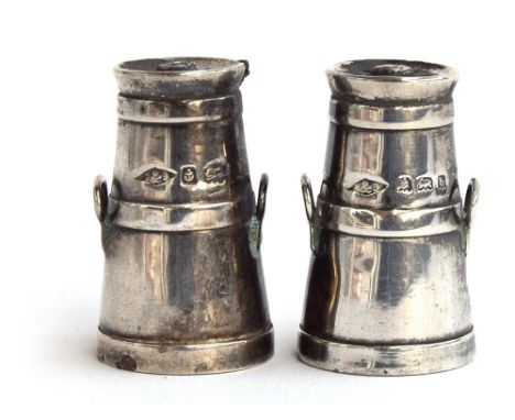 A pair of salts in the form of milk churns, by Griffiths & Singleton, Birmingham 1901Provenance: from the estate of Elizabeth