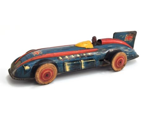 A Wells Brimtoy clockwork tinplate Racing Car - circa 1951, blue, black/red trim, cream/red wheels with Union Jack to bonnet 