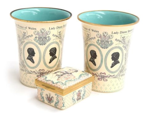 A pair of Halcyon days enamel beakers to celebrate the marriage of HRH The Prince of Wales and Lady Diana Spencer together wi