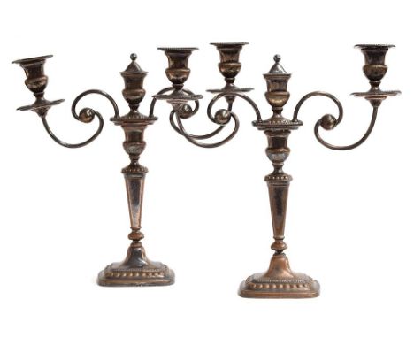 A pair of silver plated two arm candelabra, the central finial removing to reveal a third candle holder, 34cmHProvenance: fro