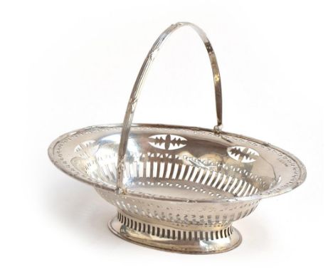 A swing handled strapwork pierced oval sweetmeat basket, inscribed, by William Henry Leather, Birmingham 1906, 4.8ozProvenanc