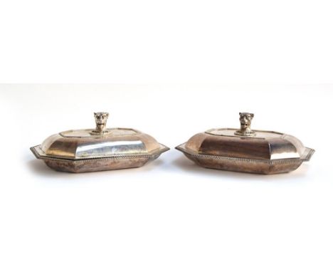 A pair of George III rectangular entree dishes and covers with canted corners and gadrooned edges, the finials modelled as li