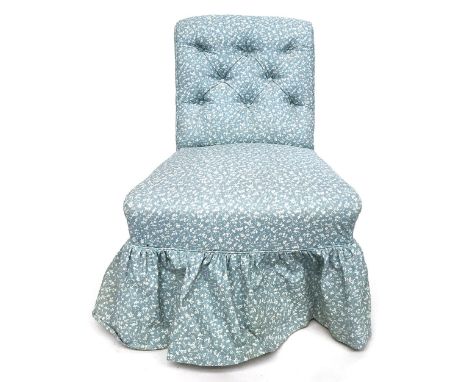 An early 20th century salon chair with button back 