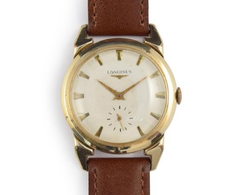 A GENTLEMAN'S 10K GOLD FILLED LONGINES WRIST WATCH CIRCA 1950s, parchment dial with sub second subsidiary dial.Movement: Mech