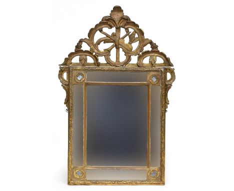 A 19th century Italian giltwood wall mirror, the square plate with mirrored border and surmounted by a pierced musical trophy