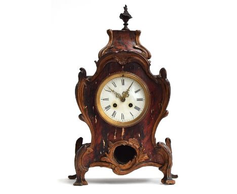 A Louis XV style tortoiseshell veneered mantel clock of cartouche form, the dial with Roman numerals, 19th Century, 43cmHProv