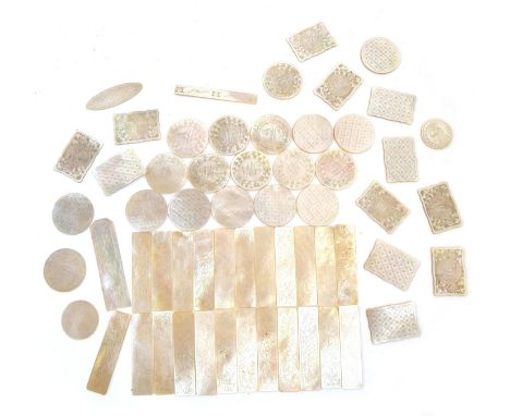 A large collection of Chinese mother of pearl gaming counters, many monogrammed 'JW', oblong (23), circular (19), rectangular