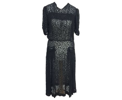 Black silk devore 1930s dress with smocking detail across the chest and on false patch pockets to skirt (size 10-12 approx) 