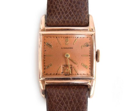 A 10CT GOLD FILLED LONGINES WRIST WATCH *BROKEN CRYSTAL* CIRCA 1940s, REF 7324448, COPPER DIAL WITH SUB SECONDS.Movement: 15J