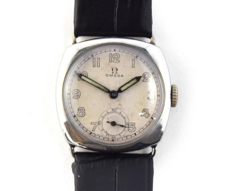 A GENTLEMAN'S STAINLESS STEEL OMEGA WRIST WATCH DATED 1934, parchment dial with arabic numerals, railway minute divisions sub