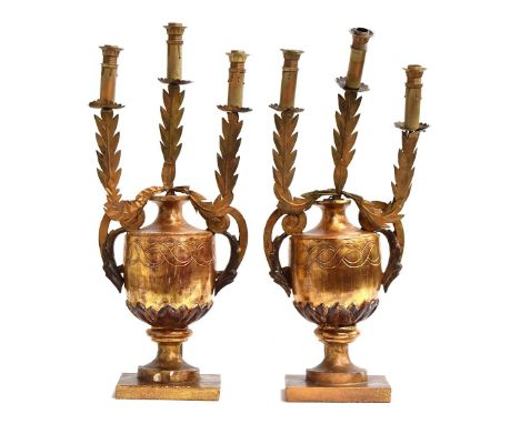 A pair of Venetian giltwood 'urn' three-light candelabra, fitted for electricity, 62cmHProvenance: from the estate of Elizabe