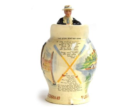 A Fielding's Crown Devon, "The Eton Boating Song", moulded pottery jug, with figural handle, the body with boating scene and 