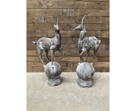 Pair of cast iron garden Stag figures or gate finials, raised on spherical ribbed base Dimensions: Height:&nbsp;92cm&nbsp; Le