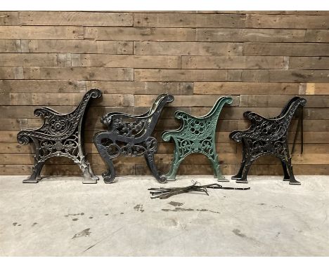 Four pairs of ornate cast iron bench ends (8)
