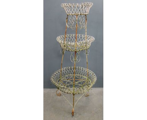Late Victorian three tier wirework planter, 135cm high