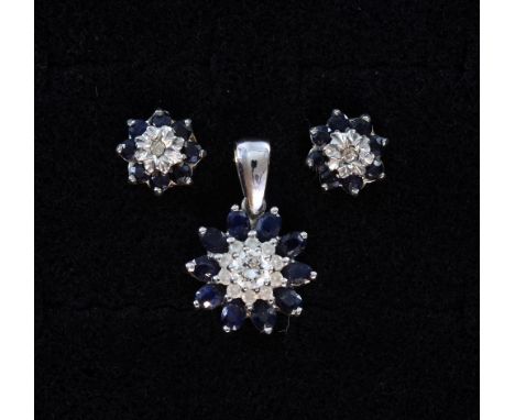 Sapphire and diamond cluster pendant, with a round brilliant-cut diamond weighing approximately 0.35cts within a white and bl